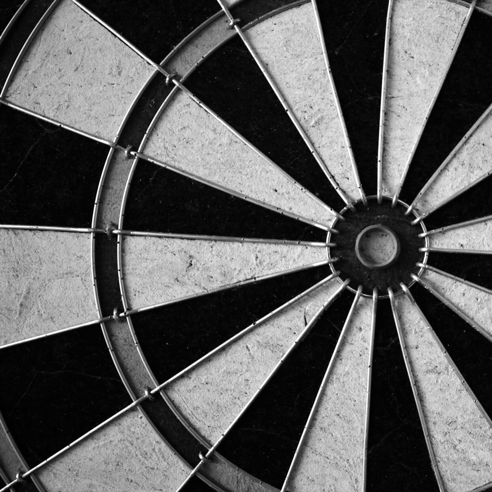 Grayscale Photo of Dartboard